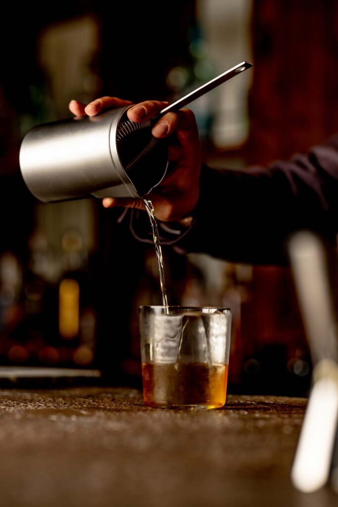 Bartender making cocktail
